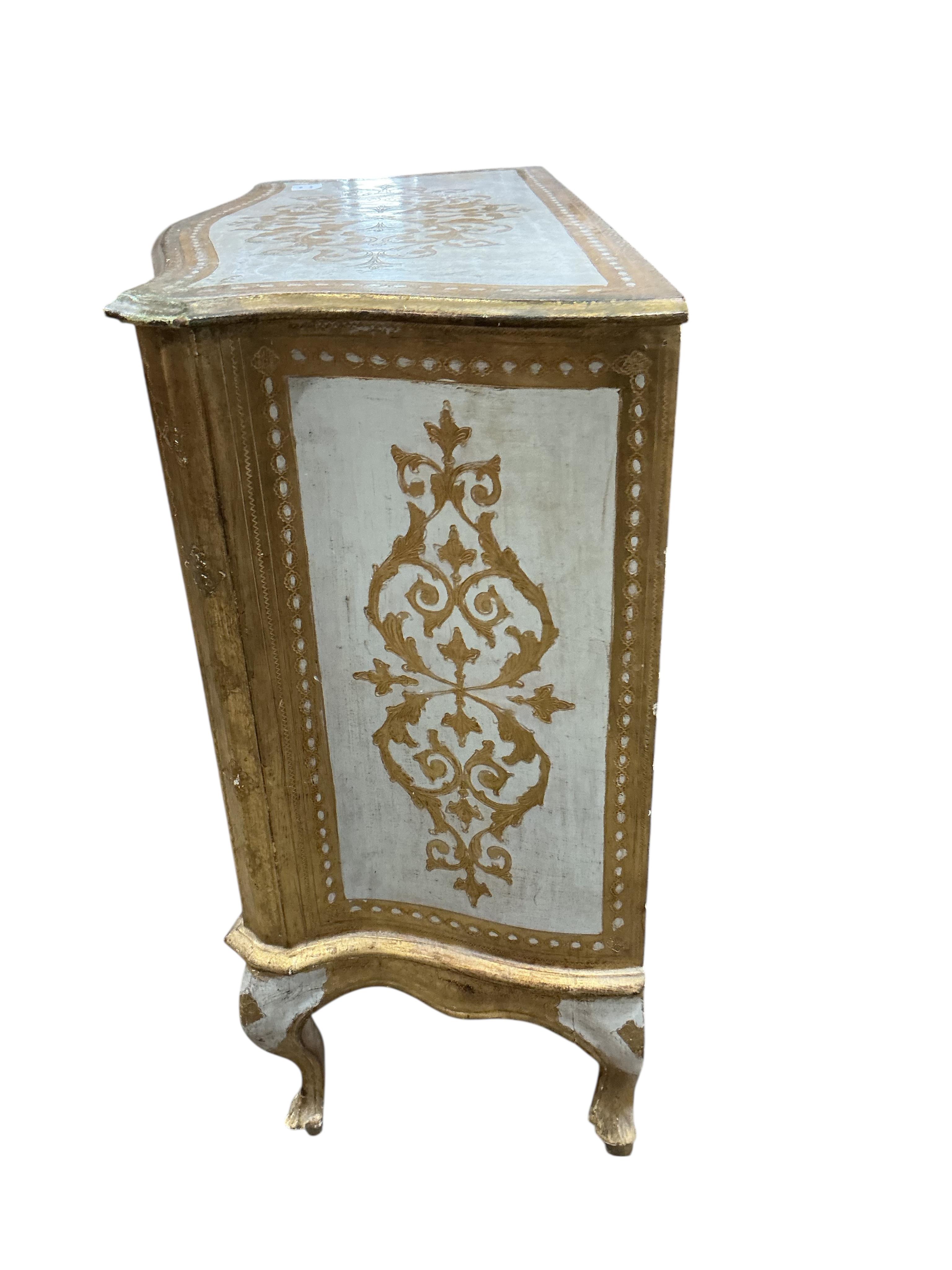 A pair of Northern Italian parcelgilt serpentine three drawer bedside chests, width 69cm, depth 38cm, height 78cm